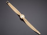 an 18 carat gold wrist watch, by cartier
