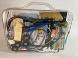 a clear case with a bunch of electronics inside of it