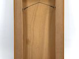 an empty wooden box with a hanger on the inside