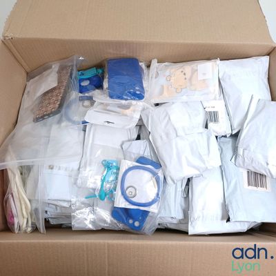 a cardboard box filled with a lot of items that are in it