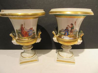 two vases sitting on a table with a painting on them