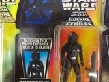 three star wars action figures sit on top of each other