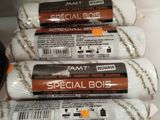 four rolls of special bok wrapped in plastic wrap on a shelf
