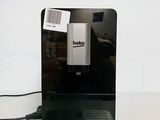a coffee maker that is sitting on a table