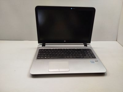 a laptop that is sitting on a white table