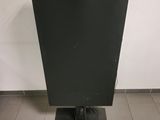 an image of a black television on a stand