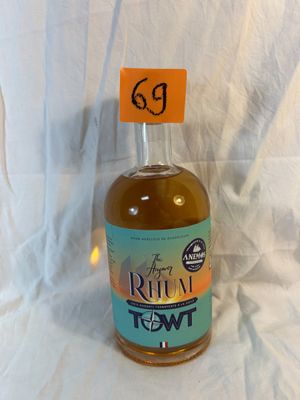 a bottle of rum in front of a white background
