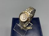 an image of a watch sitting on top of a blue box