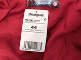 the back of a red jacket with a tag on it