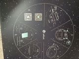 a picture of a clock that is on a table