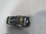 a small toy car that is sitting on a table