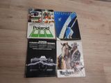 three books on a wooden floor with a horse and a car