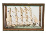 peinture représentant un voilier dans une vitrine, sur fond blanc
