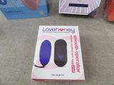 two boxes of lovehoney products sitting on a table