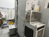 a machine that is sitting inside of a building