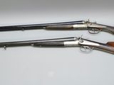 three different types of shotguns on a white surface