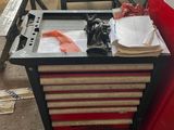 an image of a work bench with a tool box on it