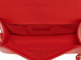 a close up of the inside of a red purse