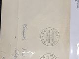 a piece of paper with a stamp on it sitting on a table
