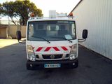 a picture of a white truck parked in a parking lot