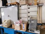 many boxes on a table with a refrigerator and a freezer