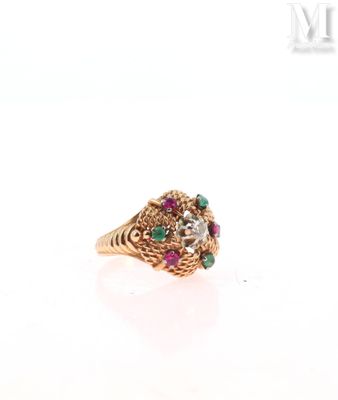 an image of a gold ring with multi colored stones on it