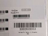 a label on the back of a laptop that has a barcode on it