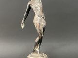 an image of a statue of a woman holding a ball