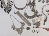 many different types of jewelry on the table