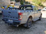 a pick up truck that is parked in a parking lot