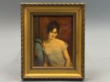 portrait d'une femme en robe bleue, encadré d'un cadre doré
