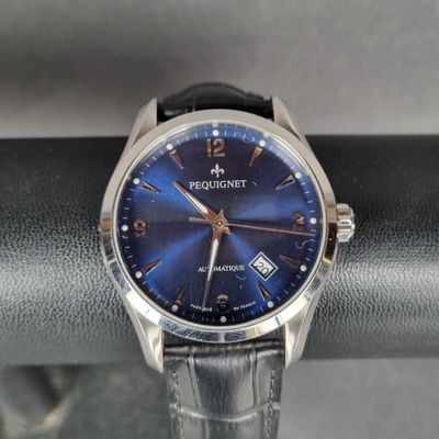 PEQUIGNET. Montre bracelet d'homme, boitier en acier, cadran…