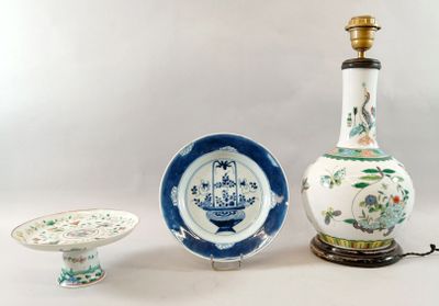 three different types of vases and a plate on the table