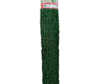 a close up of a roll of green grass on a white background
