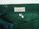 green cordurope pants with a label on the back of the pants