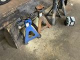 a workbench with tools on it in a garage