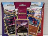 three packs of pokemon trading cards in a bag