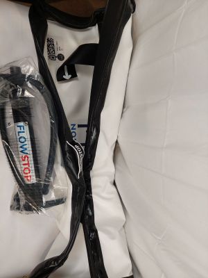 a bag with a toothbrush and a toothpaste in it