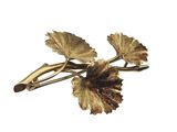 gold plated flower brooch with leaves on a white background