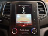 a picture of a car ' s dashboard with a camera mounted on it