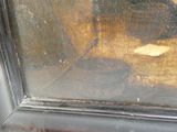 un chat qui regarde par la fenêtre