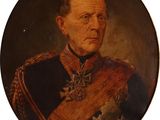 un vieux tableau représentant un homme en uniforme, avec une médaille sur la poitrine