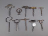 many different types of wine openers and cork openers on display