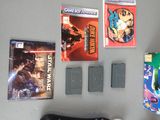 several video games on the wall next to a wii controller