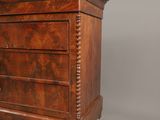 an antique chest of drawers with a marble top on a grey background