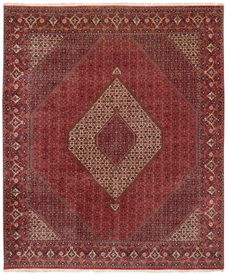 un tapis rouge orné d'un motif en losanges