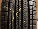 a close up of a tire on a box with a box in the background