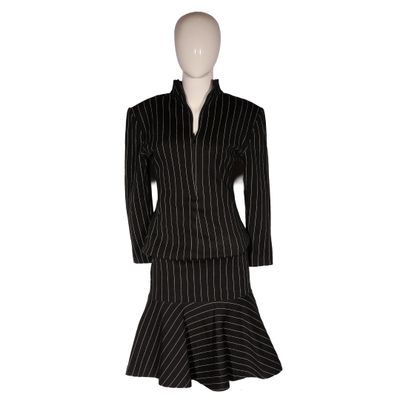 a black and white striped dress on a mannequin mannequin mannequin mannequin mannequin mannequin mannequin mannequin