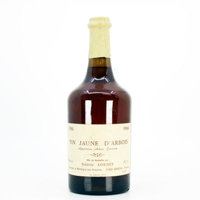 a bottle of wine that is sitting on a table