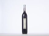 a bottle of wine that is sitting on a table